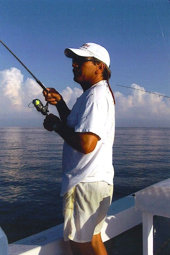 Captain Doug Martin scouting Pamlico Sound from his charter boat